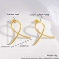 Elegant gold plated stainless steel ribbon twist stud earrings with geometric metal curves - Golden Cross EJ01-2