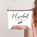 Close-up of white canvas crochet bag with black typography and yarn illustration - Crochet Hobby Craft Slogan (jiayingpbb088)