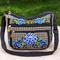Ethnic black canvas crossbody bag with blue floral embroidery and triple zippers - Blue Peony