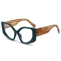Cat eye sunglasses with dark green frame and amber tortoise shell temples on white background - Green Frame