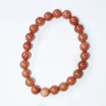 Red brown goldstone beaded bracelet with shimmering 8mm round gemstone beads - Gold Sandstone