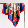Close-up of ginkgo leaf print on satin silk square scarf with fine rolled edges - 90x90cm / Navy Blue