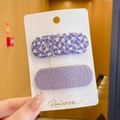 Set of two purple floral and waffle texture hair clips on a white display card - Fabric Wrapped Clip (3290) / 2 Pcs/Set / Purple