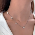 Silver minimalist heart necklace featuring B and F letter charms worn on the collarbone - Silver BF Heart (11295)