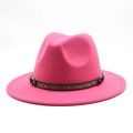 Detail of fuchsia wool fedora hat with bohemian woven band and metal ring accent - Rose Red