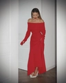Detail of red off-shoulder knitted maxi dress featuring fine ribbed texture and elegant fit - S / Red