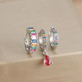 Macro detail of silver earrings set with colorful rainbow stones and red pear pendant - Three-Piece Set / Silver-Multicolor Zirconia