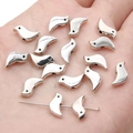 Silver bird shaped alloy beads for DIY jewelry making pendants for necklaces and bracelets - Bird / 12x6mm