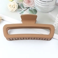 Brown rectangular leopard print hair claw clip in a glossy finish for hair styling - Rubber Earthy Yellow