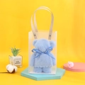 Detailed view of a cute blue bear-shaped towel gift in a clear Just For You carry bag - Blue
