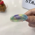 Detail of handmade oval pearlescent hair clip with France Handmade lettering - Approx. 5cm / Green Dazzle