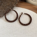 Close-up of vintage flocking leopard print hoop earrings on a beige textured background - 43# Medium Leopard Flocking Hoop Earrings (Silver Pin-Coffee-Round-Medium)