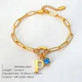 Elegante 14K vergulde roestvrijstalen armband met P-hanger en blauwe edelsteen - Letter P / Staalkleur