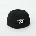 Detail of white embroidery Est. Number 23 on high-quality black cotton docker hat - Letter 23 Style / Black
