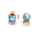 Macro detail of 10mm blue floral enamel stainless steel beads with 4mm hole size - Sky Blue Base White Flower