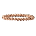 Dettaglio macro di perle sfaccettate in oro rosa su un bracciale da uomo vintage - Ematite Oro Rosa Sfaccettata