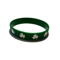 Detailed top view of a green St. Patrick's Day silicone wristband with white clover patterns - Clover Style