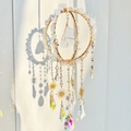 Detailed suncatcher with clear crystal stones and golden stars creating rainbow light - White Crystal