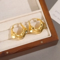 Elegant irregular golden hoop earrings with high-shine metal finish displayed in box - Gold (Real Gold Plated)