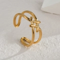 Minimalist gold double cross line ear cuff with a polished metallic finish on white stone - Gold Double Layer Cross (R733-C)