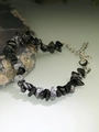Macro detail of natural irregular black and white stone bracelet with silver extender chain - Dark Grey
