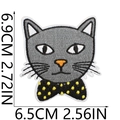 Detailed embroidery patch of a grey cat with yellow polka dot bow, size 6.5x6.9cm - No. 41 (Grey Cat with Polka Bowtie)