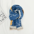 Kids warm winter scarf in blue with white and yellow geometric patterns and fringe detail - Blue