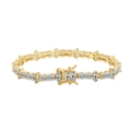 S925 sterling silver tennis bracelet with round and rectangular cubic zirconia in gold - 3*5mm Square + 4mm Round 14k Gold Length: 16.5cm Weight: Approximately 13.4g