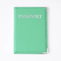 Mint green PU leather passport holder with silver lettering and metal corner protectors - Green