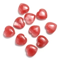 Macro shot of 20mm heart-shaped pink rose quartz and amethyst gemstones on white background - Watermelon Quartz