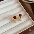Detail of French style gold pearl ear clips with red beads in a wooden jewelry box - Ear Clip-Gold-Red 6mm
