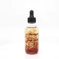 Safflower multi-use oil 60ml in clear glass bottle with dried flowers for skin and hair - Safflower Oil
