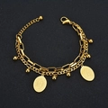 Close-up of double-layer gold chain bracelet with Virgin of Guadalupe oval charms - Gold Color Double Layer Virgin Mary Coin