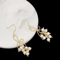 Elegant gold bow earrings with cluster pearl drop dangles for women - Bowknot Earrings