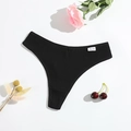 Black ribbed cotton thong for women with elastic branded waistband on white background - M / Black