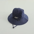 Detailed view of navy blue boys bucket hat with LUCKY embroidery and adjustable chin strap - 52cm (2-5 Years) / Navy Blue