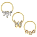 Detailed view of three gold nose rings featuring marquise, butterfly, and flower zircon designs - 1.2x8mm / Gold-Tone Marquise Rhinestone Butterfly Floral Style (Set of 15)