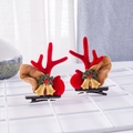 Red Christmas antler hair clips with gold bells and green leaves for festive hairstyles - Christmas Bell Pair