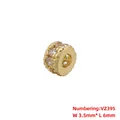 Makroaufnahme von 6x3,5 mm Kupfer-Abstandshaltern mit Zirkonia für Schmuck - VZ395 Gold 3,5*6mm