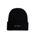 Detail of NOT REALLY white embroidery on a black ribbed knit beanie hat for winter - M (56-58cm) / Black
