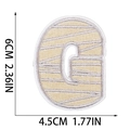 Detail view of 6cm beige embroidered letter C patch with precise size measurements - Letter G