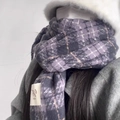 Stylish purple plaid scarf made of thick warm fabric worn by a model in winter fashion - Taro Purple