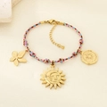 Bracciale bohémien intrecciato a mano con ciondoli a sole e fiori in corda blu, rosa e marrone - Mix Blu Rosa Marrone (KB207968-SXSJ)
