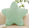 Star-shaped plush pillow in light green soft fabric on a beige sofa - Light Green