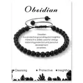 Adjustable black obsidian beaded bracelet with handmade woven cord on display card - Obsidian