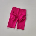 Detail view of high waist magenta cycling shorts with scrunch butt lifting design - Magenta