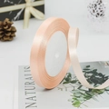 Champagne satin ribbon roll with smooth silk finish for elegant gift wrapping - 07# Champagne Pink