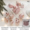 Set de adornos navideños en oro rosa con bolas brillantes y estrellas en cesta - Rosa/Caja