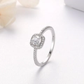 Close-up of a S925 sterling silver ring with square-cut stone and pavé set diamonds - US 5 / Silver (White Zirconia)