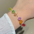 Vibrant rainbow faceted crystal bead bracelet worn on wrist with a clean white aesthetic - Rainbow Faceted Crystal Bracelet (2882)